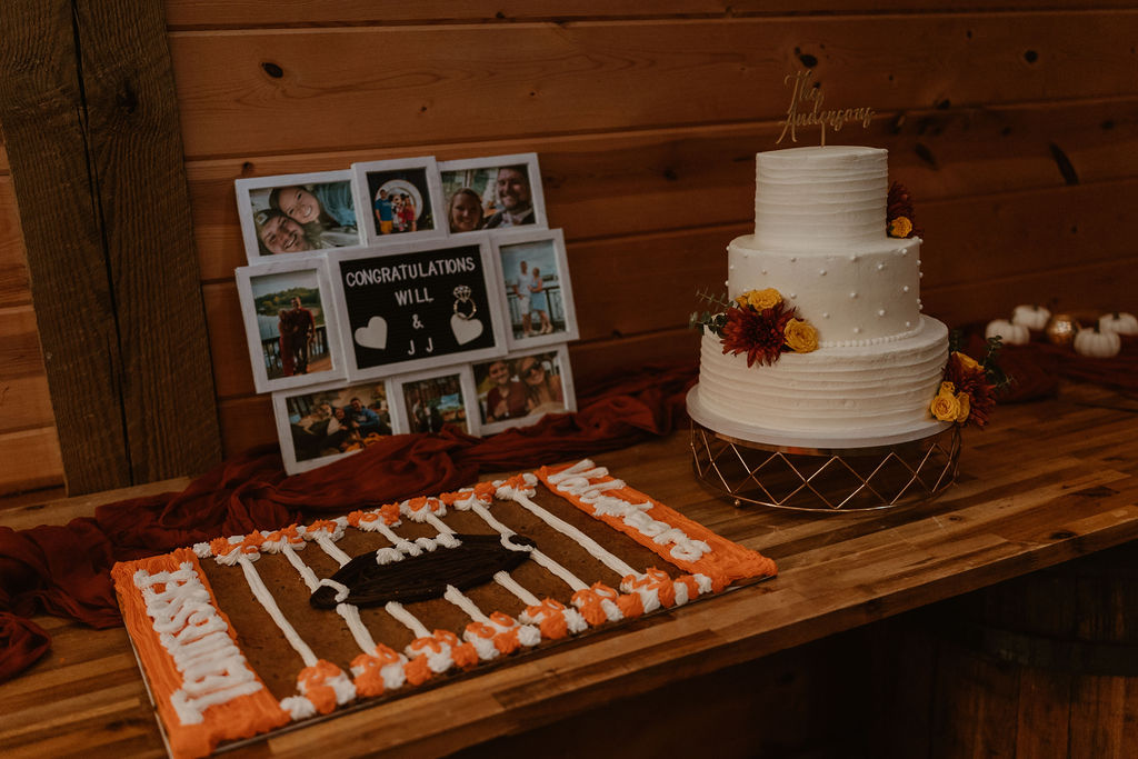 JJ & Will dessert table with Vols cookie cake, photo collage, and Andersons wedding cake at Covey Creek